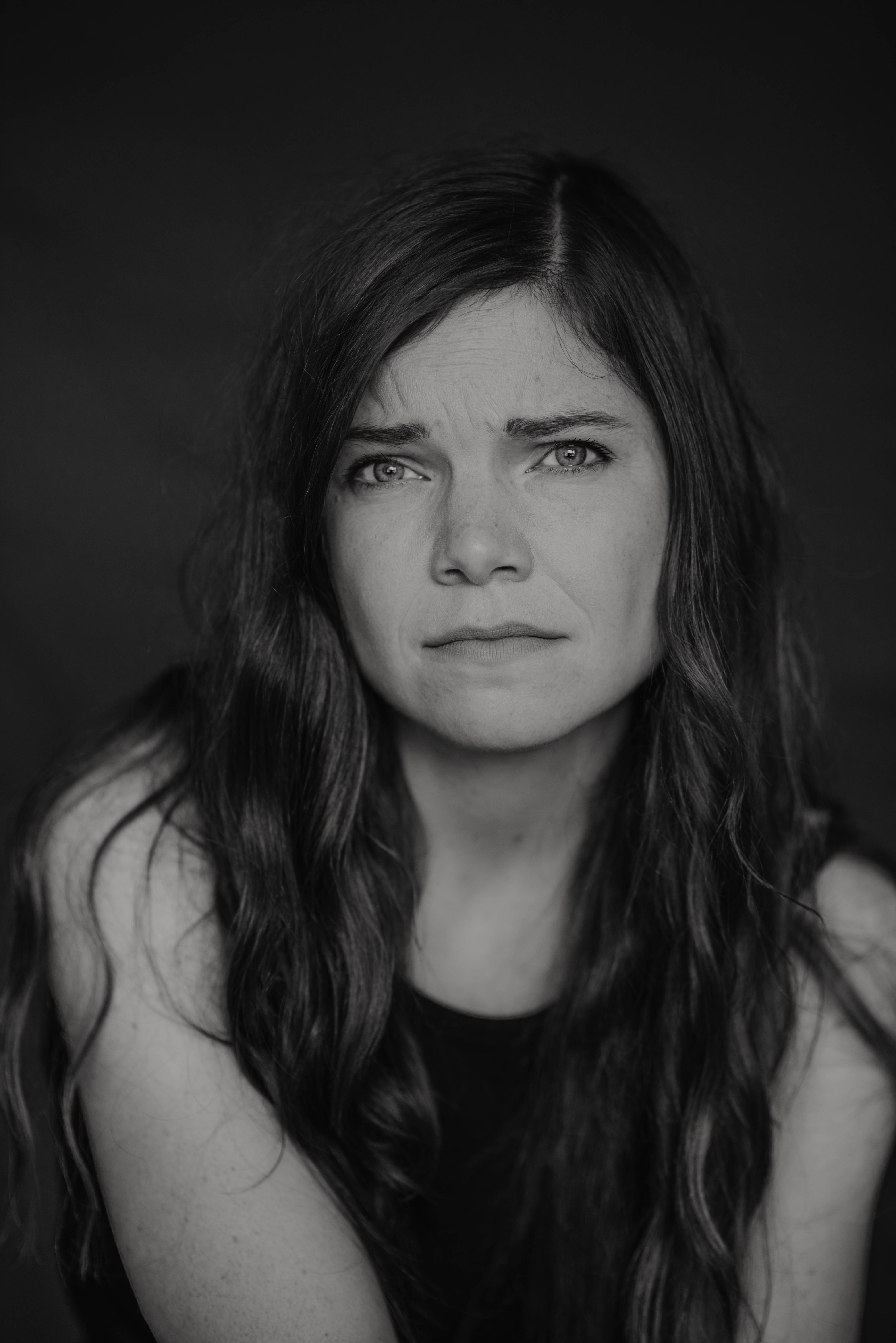 Outtake from a headshot session. Actress with a confused expression.